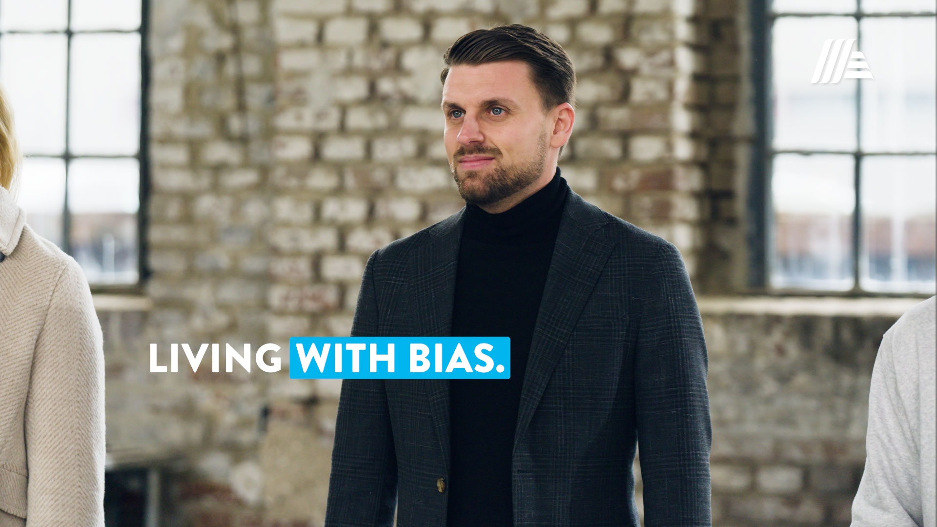 Man in front of stone wall – living with bias