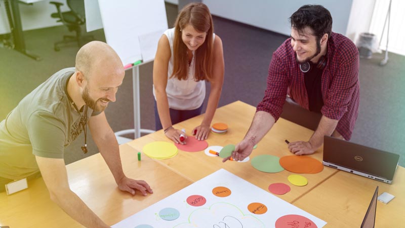People working together in a meeting room.