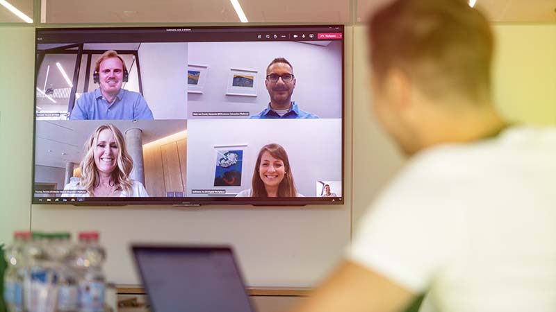 A group of people in a video call.